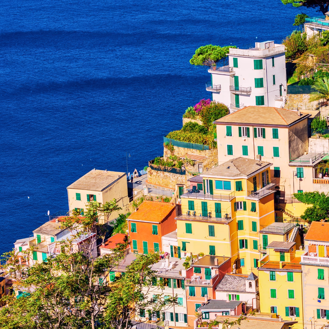 View of a Cinque Terre village with colourful houses overlooking the Ligurian Sea